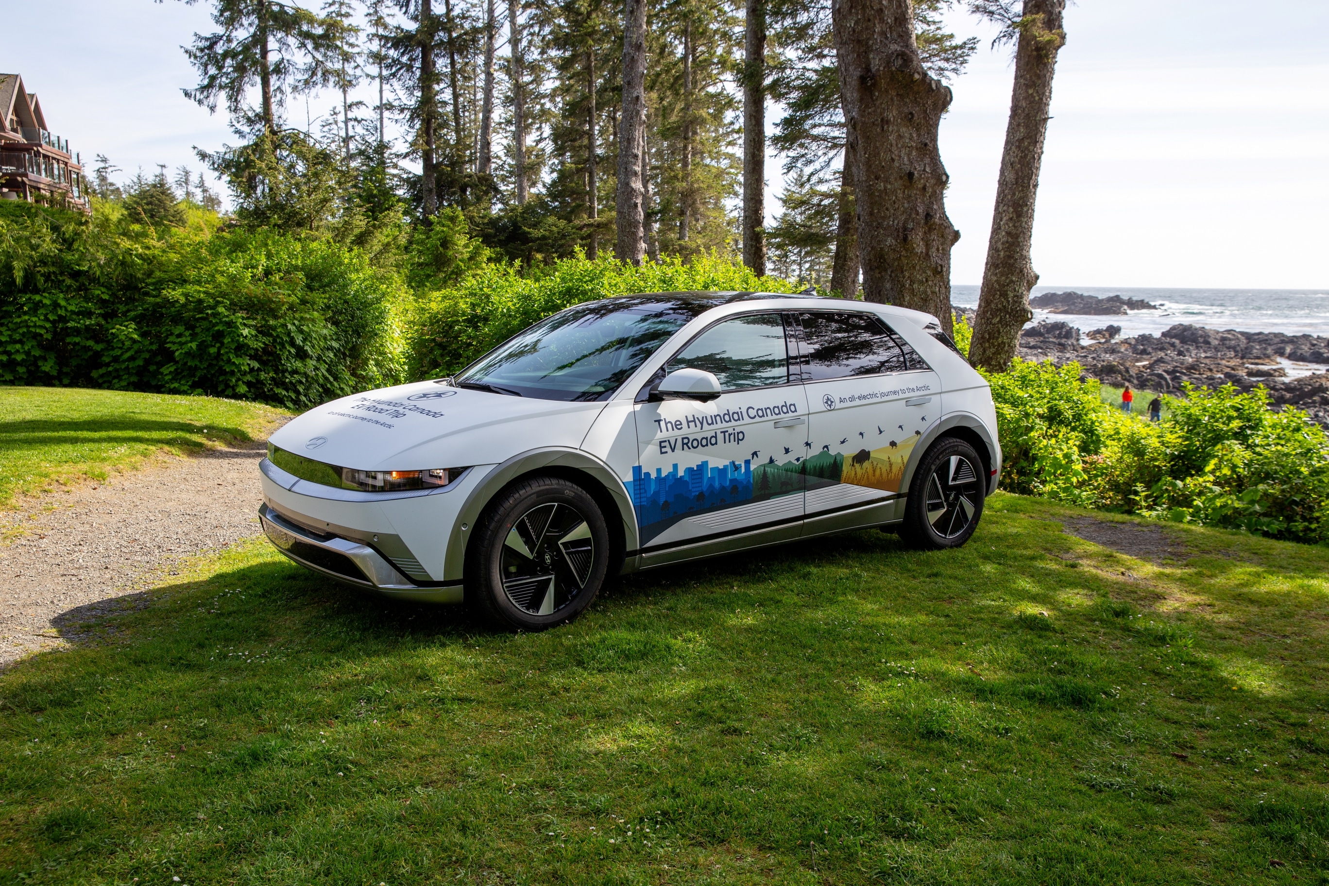 Side exterior view of Hyundai IONIQ 5 with Hyundai Canada EV Road Trip custom wrap