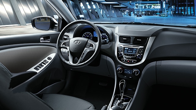 The interior view of the 2017 Hyundai Accent driver's seat and steering wheel