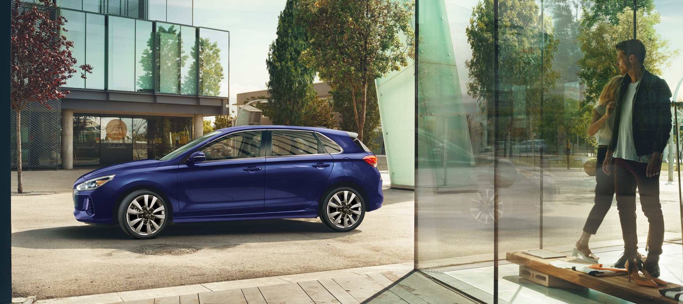Photo of the 2018 Elantra GT in marina blue by Hyundai parked on a street