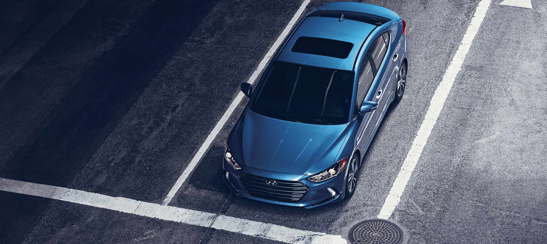 Birds eye view of blue Hyundai Elantra V3 2018 with power sunroof