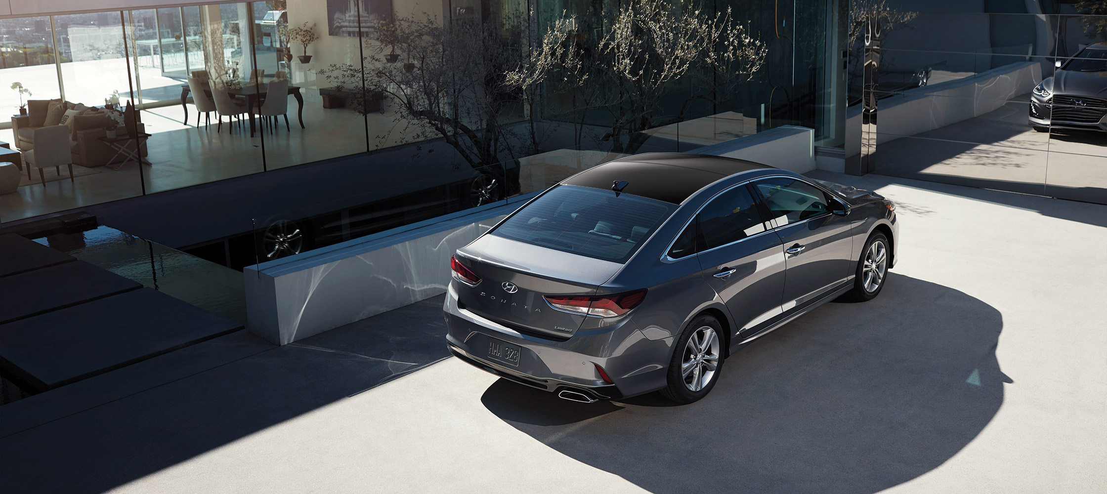 A parked Hyundai 2018 Sonata in stormy cloud.