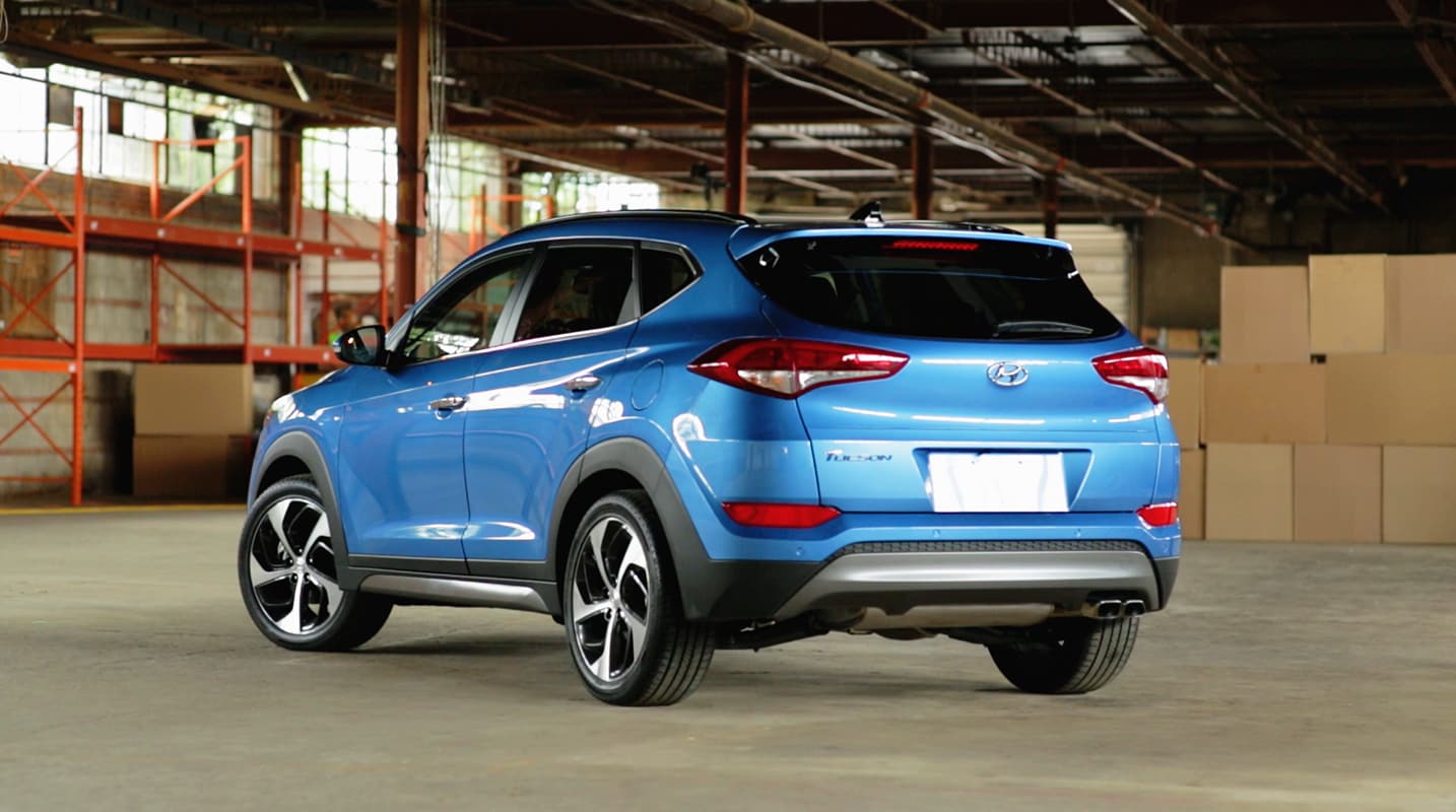 Image of the 2017 Tucson in blue in a garage by Hyundai