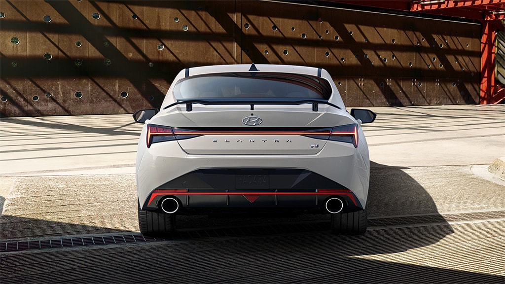 N rear bumper, diffuser, and Full LED tail lights on back view of the 2022 ELANTRA N in white