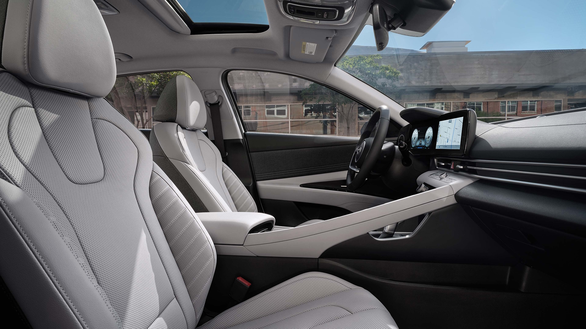 Side interior view of the 2022 Elantra in light grey leather