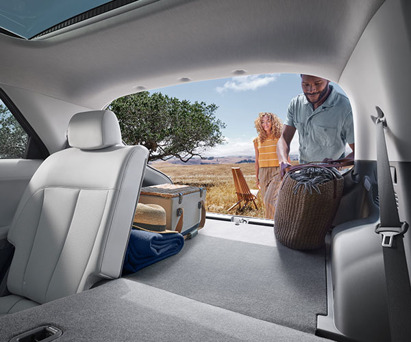 Cargo space of the 2022 IONIQ 5 showing the 60/40 split folded down rear seats