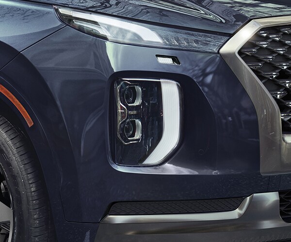 Exterior front view of LED headlights on the 2022 PALISADE