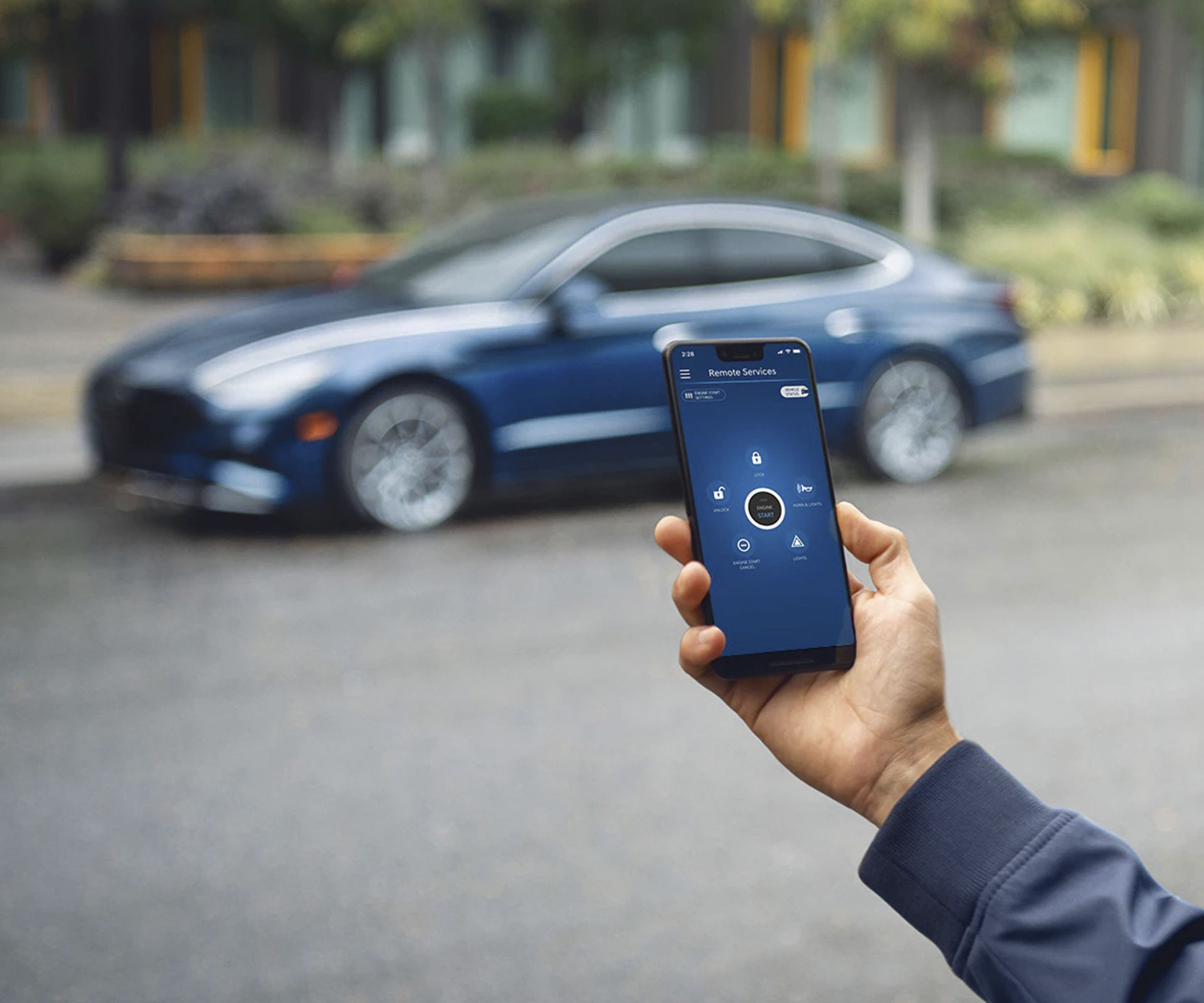 View of the Bluelink App and exterior view of the 2022 SONATA