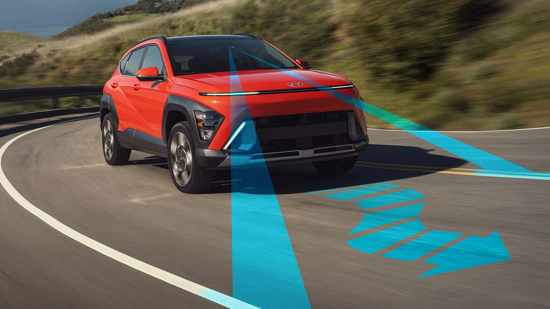 A 2027 Hyundai Kona drives along a road using its standard Lane Following Assist