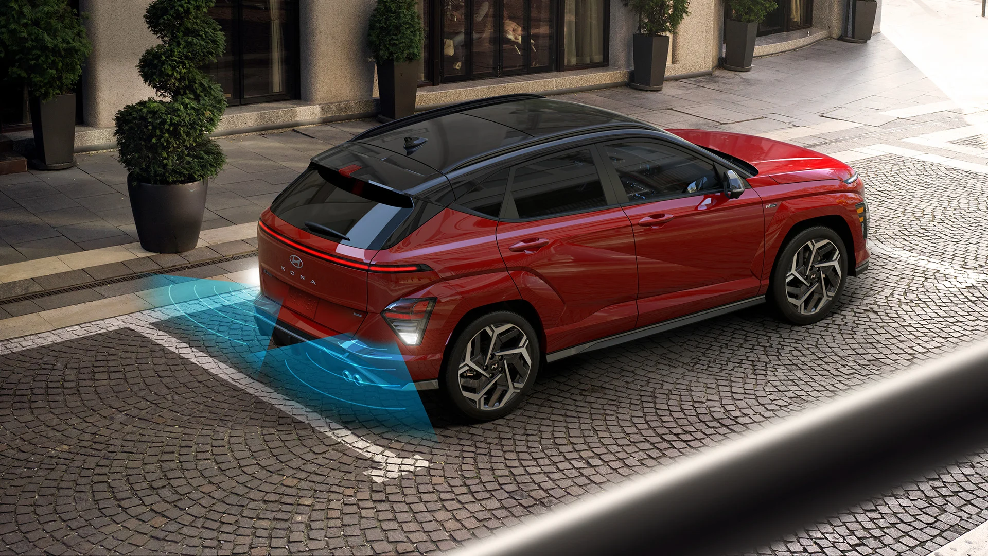 A 2027 Hyundai Kona demonstrating its available Parking Distance Warning while reversing